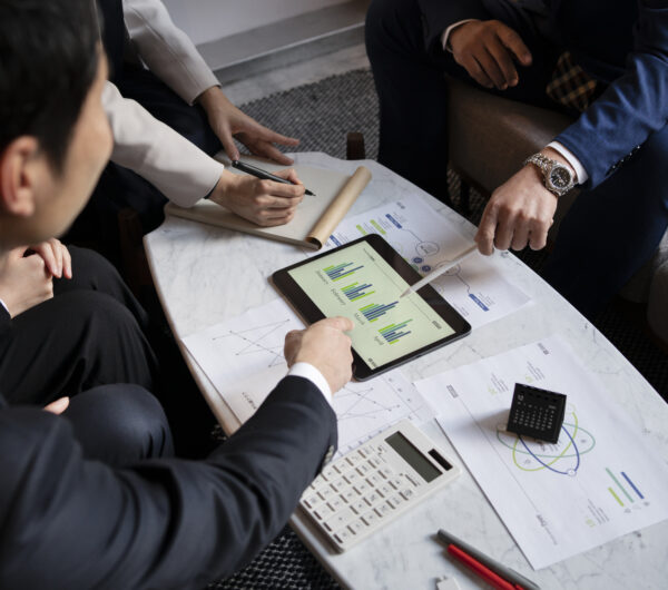 business-people-working-with-ipad-high-angle